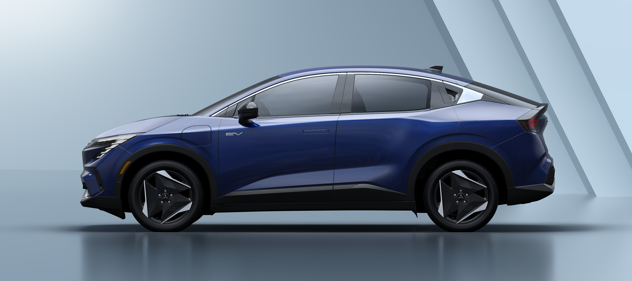 2027 Mitsubishi Eclipse Sportback EV side profile Side view of a blue 2027 Mitsubishi Eclipse Sportback EV with a 75 kWh battery