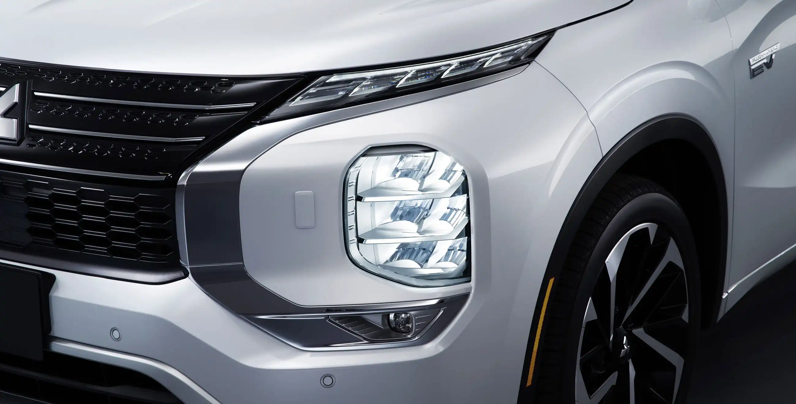 Front LED headlight on a 2024 Mitsubishi Outlander PHEV SUV